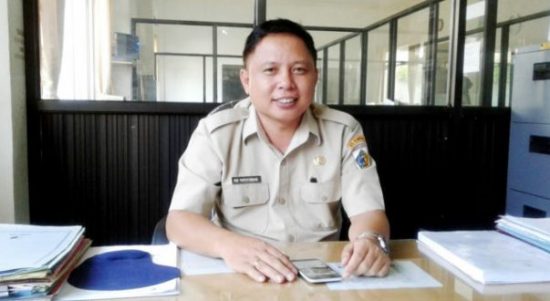 Kepala Disdukcapil Kotamobagu Roy Paputungan. Foto: dok/bolmong.news