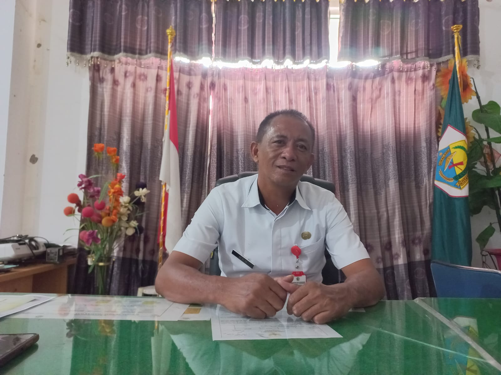Kepala Dinas Kearsipan dan Perpustakaan Kotamobagu, Ham Rumoroy. (Foto: Miranty Manangin/Bolmong.News)