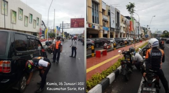 Tampak razia kendaraan parkir sembarangan yang dilakukan Dishub Manado di Kecamatan Sario, Kamis (26/1/2-23). Foto: Waldi Mokodompit.