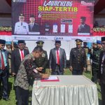 Peluncuran aplikasi SIAP TERTIB ditandai launching oleh Pj Wali Kota Kotamobagu Asripan Nani, dalam momentum upacara peringatan Hari Pahlawan yang digelar di Lapangan Desa Kopandakan Satu, Jumat (10/11/2023). Foto: Miranty Manangin/bolmong.news