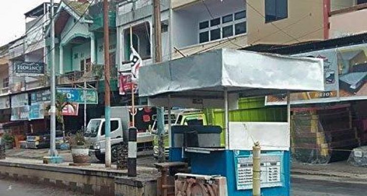 Tampak pos parkir di lokasi Pasar 23 Maret Kotamobagu belum beroperasi.