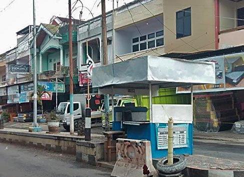 Tampak pos parkir di lokasi Pasar 23 Maret Kotamobagu belum beroperasi.