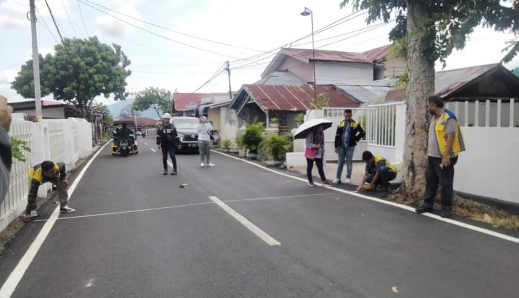 Proyek peningkatan jalan Dinas PUPR Kotamobagu. Foto: Nindy Pobela/Bolmong.news