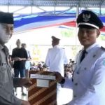 Pj Bupati Bolmong dr Jusnan Calamento Mokoginta MARS, saat menyerahkan SK penyesuaian masa jabatan kepada 193 Kepala Desa atau Sangadi, di Pendopo Kantor Bupati Bolmong, Lolak, Kamis 4 Juli 2024, siang tadi.(foto.Diskominfo Bolmong)