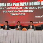 KPU Bolmong gelar pengundian nomor urut paslon Pilkada Bolmong 2024, Gedung Convention Hall Yadika, Kopandakan II, Kecamatan Lolayan, Kabupaten Bolaang Mongondow (Bolmong), Senin 23 September 2024, siang.(foto.yudi/bolmong.news)