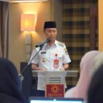 Bupati Bolsel, Iskandar Kamaru saat memberikan sambutan pada Pelatihan Gizi dalam Situasi Bencana yang berlangsung di Hotel Quality Manado, Rabu, (23/7/2025). Foto: Wawan Dentaw/Bolmong.news