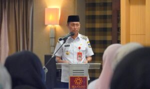 Bupati Bolsel, Iskandar Kamaru saat memberikan sambutan pada Pelatihan Gizi dalam Situasi Bencana yang berlangsung di Hotel Quality Manado, Rabu, (23/7/2025). Foto: Wawan Dentaw/Bolmong.news