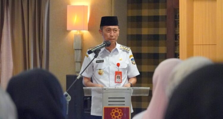 Bupati Bolsel, Iskandar Kamaru saat memberikan sambutan pada Pelatihan Gizi dalam Situasi Bencana yang berlangsung di Hotel Quality Manado, Rabu, (23/7/2025). Foto: Wawan Dentaw/Bolmong.news
